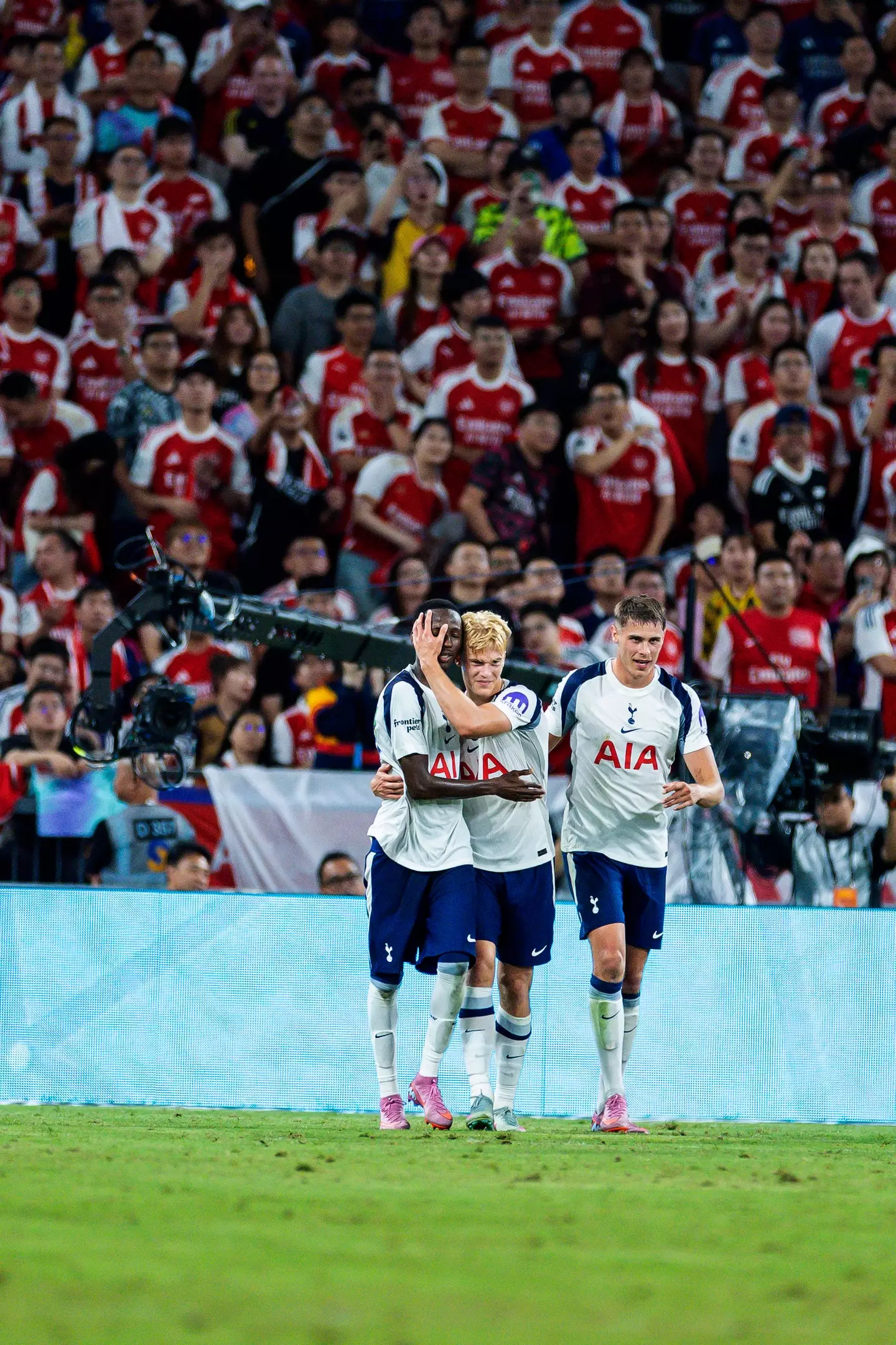 Pape Sarr celebrates his stunning goal with teammates. Image: Getty
