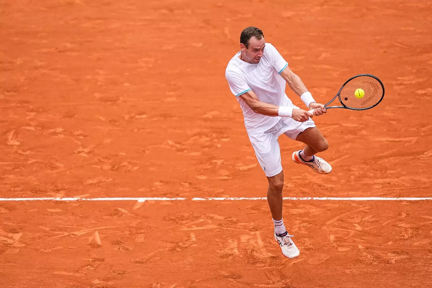 Roman Safiullin of Individual Neutral Athlete in action at the 2024 Olympics. Image: Getty