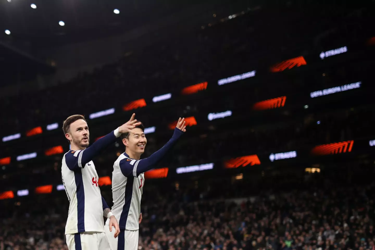 Son Heung-min celebrated with James Maddison as Spurs doubled their lead in the Europa League match against AZ Alkmaar. (Image: Getty)