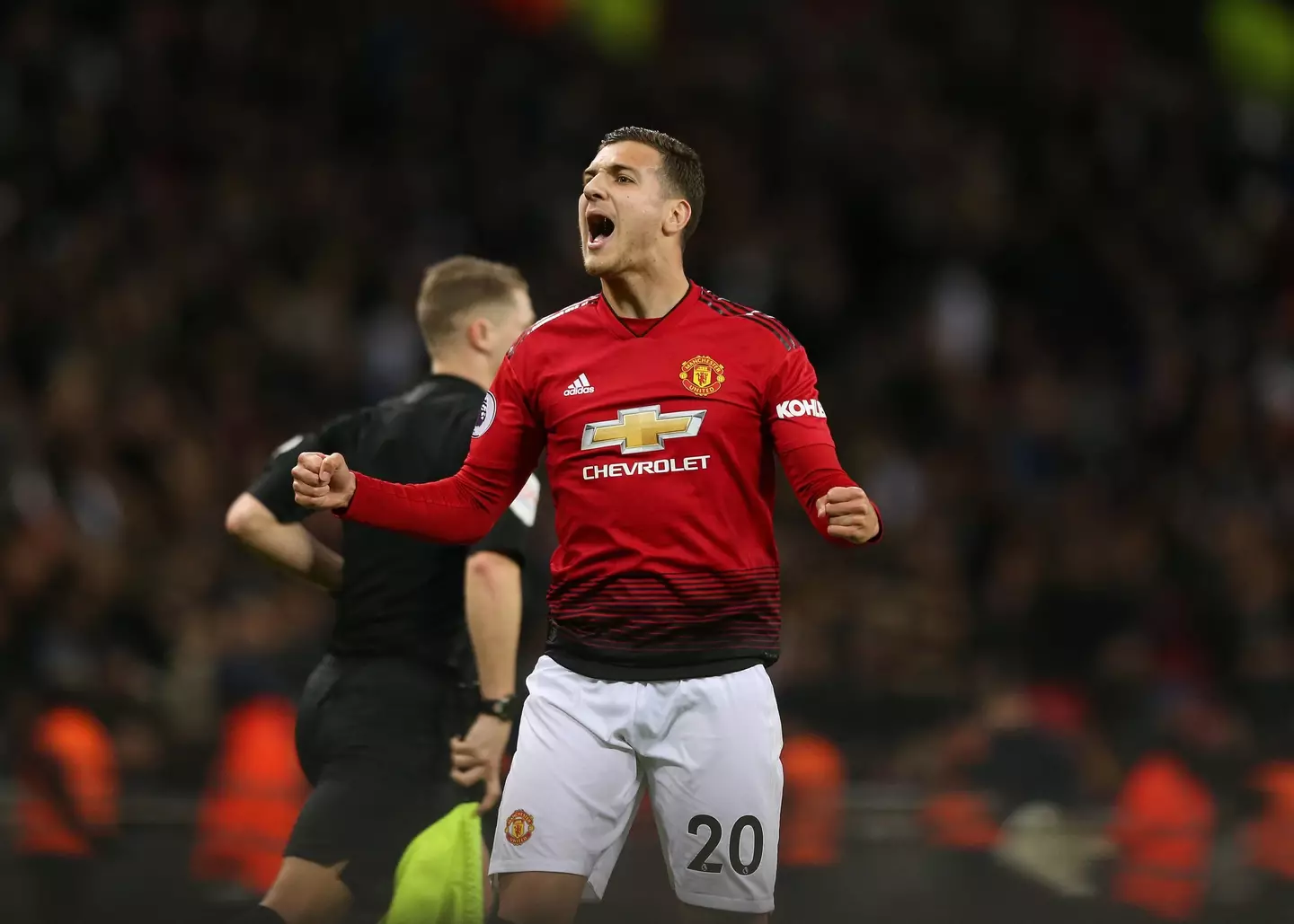 Diogo Dalot celebrates after helping Manchester United defeat Tottenham 1-0 at Wembley Stadium in January 2019 |