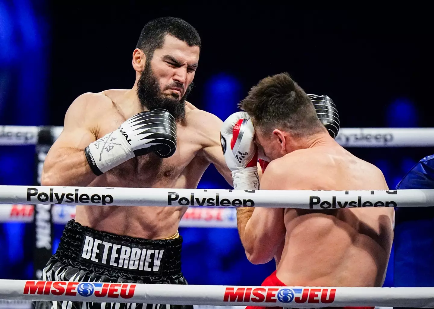 Artur Beterbiev lands a punch on Callum Smith. Image: Getty 