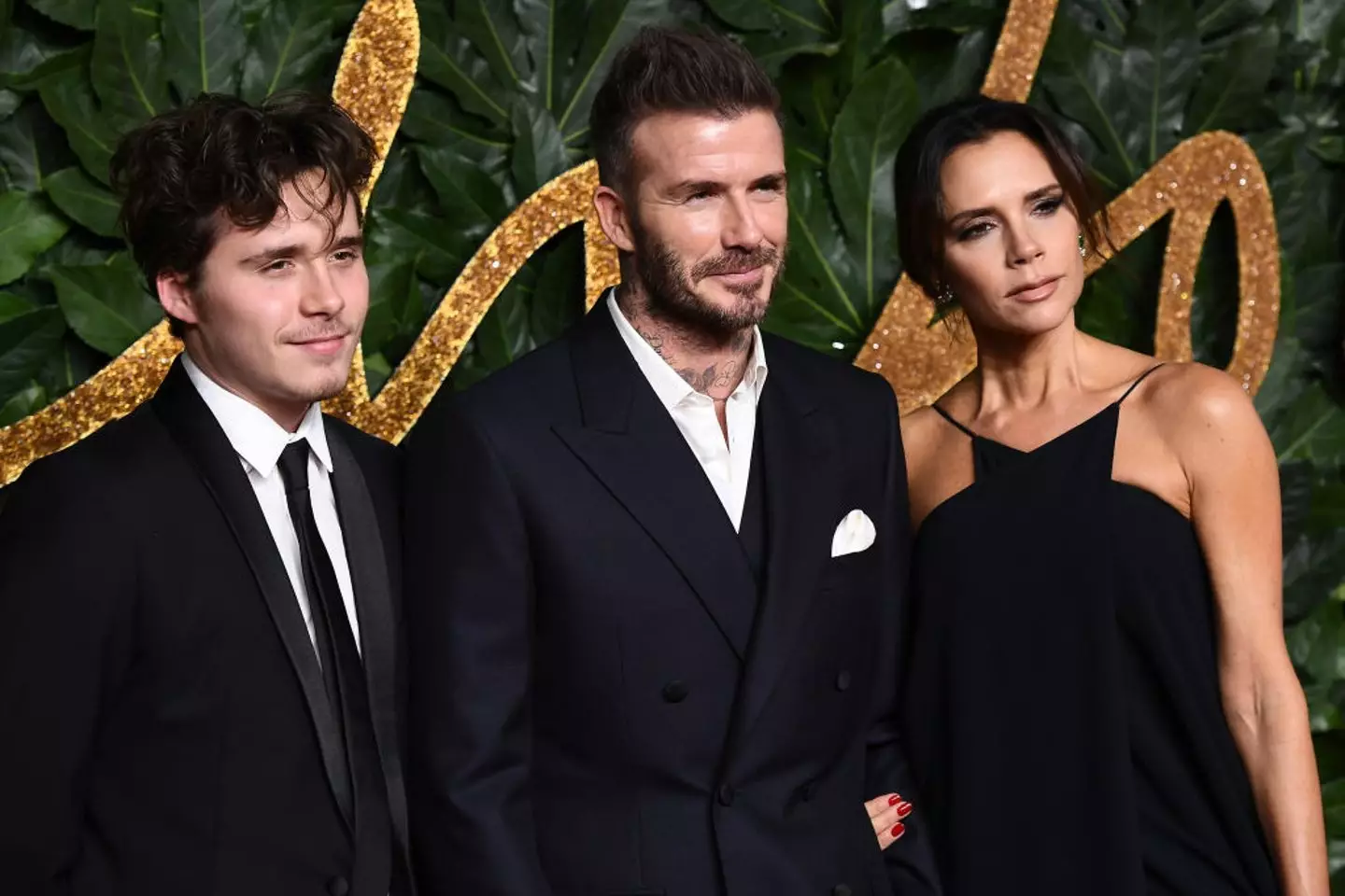 Brooklyn, David and Victoria Beckham (Credit:Getty)