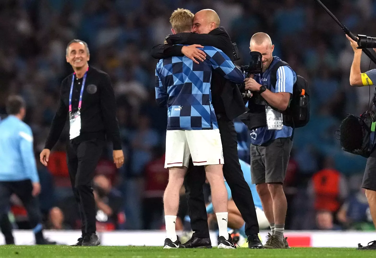 Pep Guardiola celebrates with Kevin De Bruyne after Manchester City win the Champions League. Image: Alamy