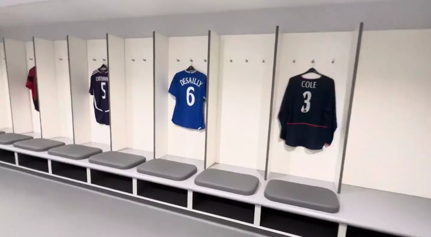 The away dressing room at Anfield, featuring Fabio Cannavaro's Real Madrid jersey. Image credit: YouTube/LMC VLOGS