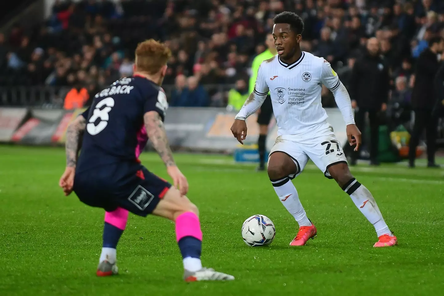 Ethan Laird in action for Swansea City against Nottingham Forest |