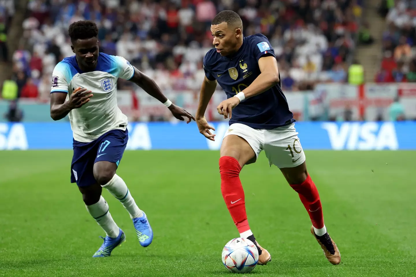 Kylian Mbappe and Bukayo Saka during England vs. France at the 2022 World Cup. Image: Getty 