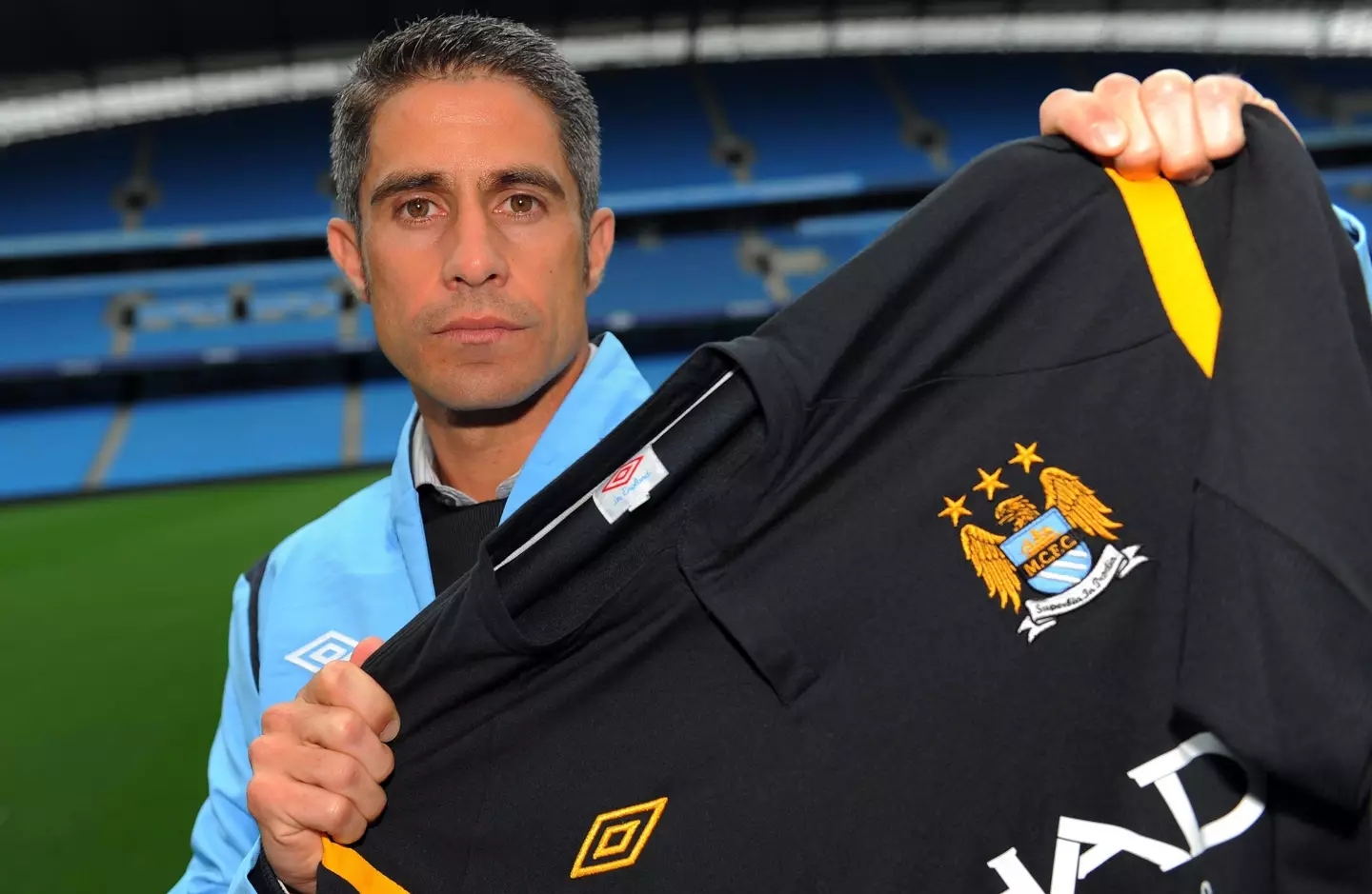 Sylvinho presented as a Manchester City player. PA Images / Alamy