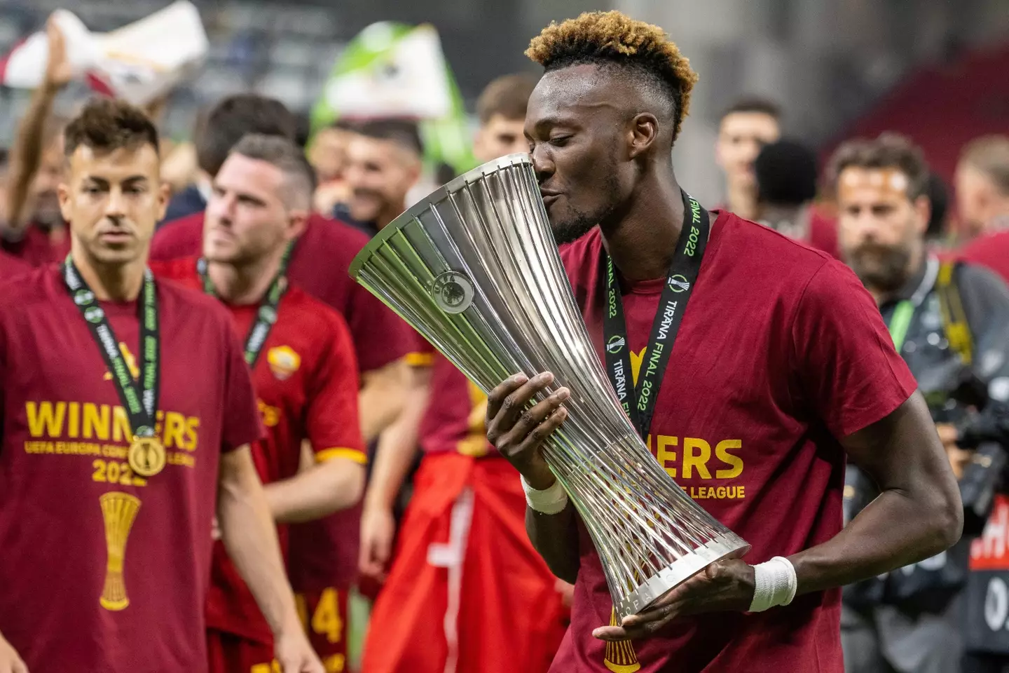 Tammy Abraham of AS Roma celebrates with trophy during the UEFA Conference League final match between AS Roma and Feyenoord. (Alamy)