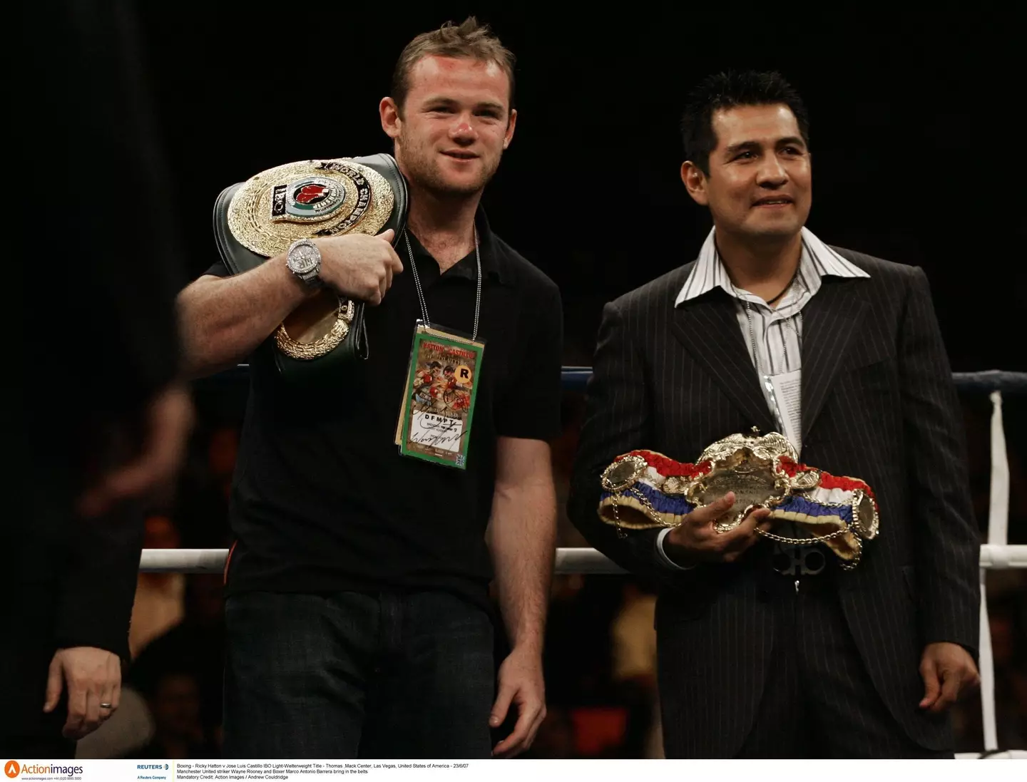 Wayne Rooney and boxer Marco Antonio Barrera bring in the belts ahead of Ricky Hatton v Jose Luis Castillo in Las Vegas. Image credit: Alamy