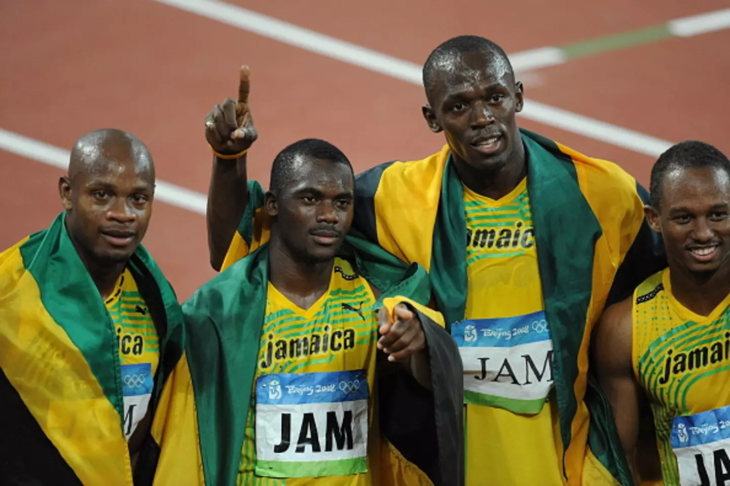 Carter (second from left) failed a drugs test almost nine years after the 4x100m relay final (Image: Getty)