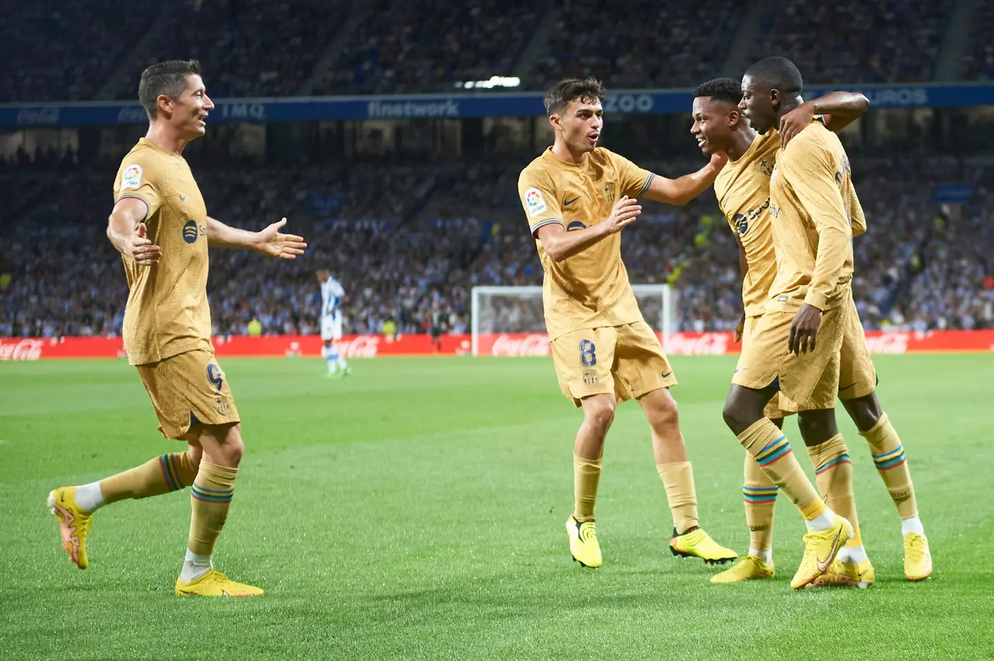 Ansu Fati celebrating with his Barcelona teammates. (Image