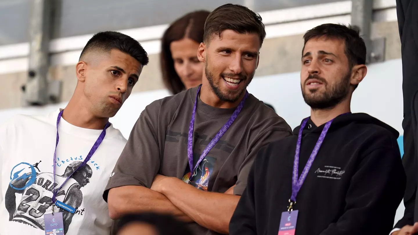 Joao Cancelo, Ruben Dias, and Bernardo Silva of Manchester City.