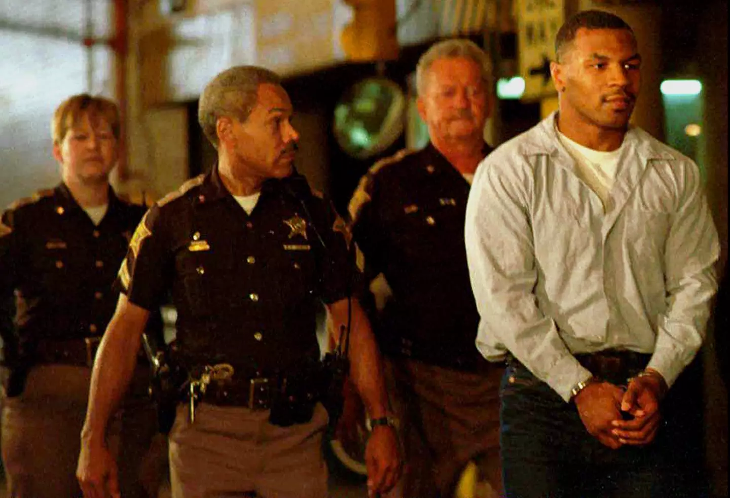 Mike Tyson in handcuffs