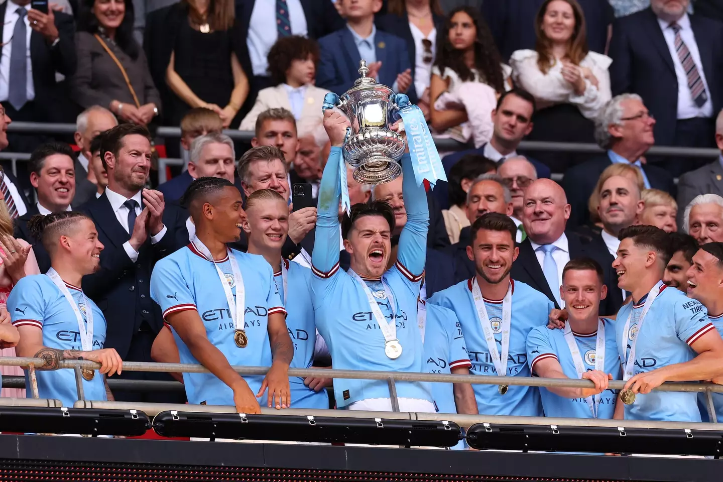 Grealish held the FA Cup aloft at Wembley yesterday. (