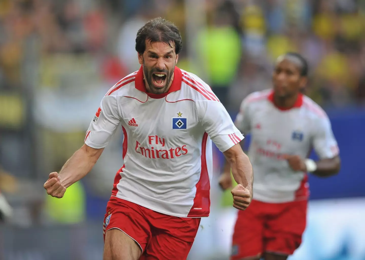 Ruud van Nistelrooy celebrates scoring for Hamburg against Borussia Dortmund (Image: Getty)