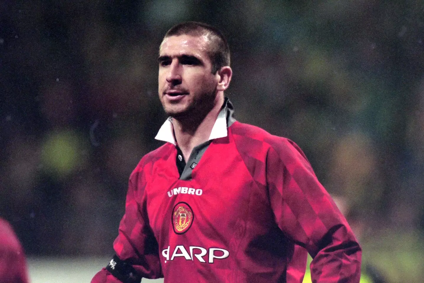 Eric Cantona in action for Manchester United back in 1997. Image: Getty