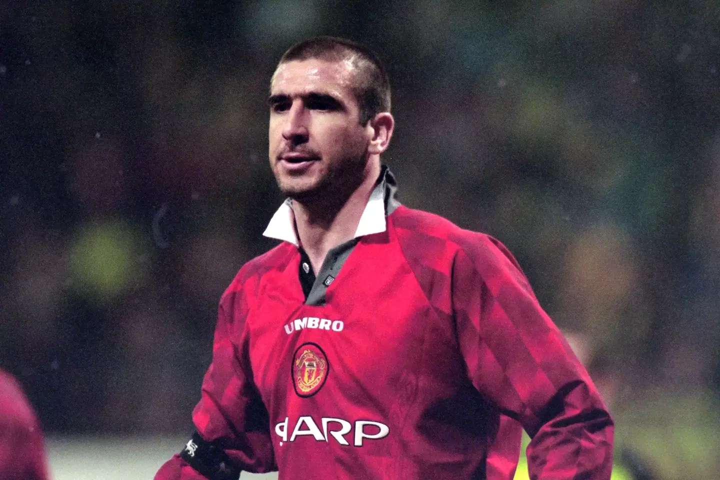 Eric Cantona in action for Manchester United back in 1997. Image: Getty 