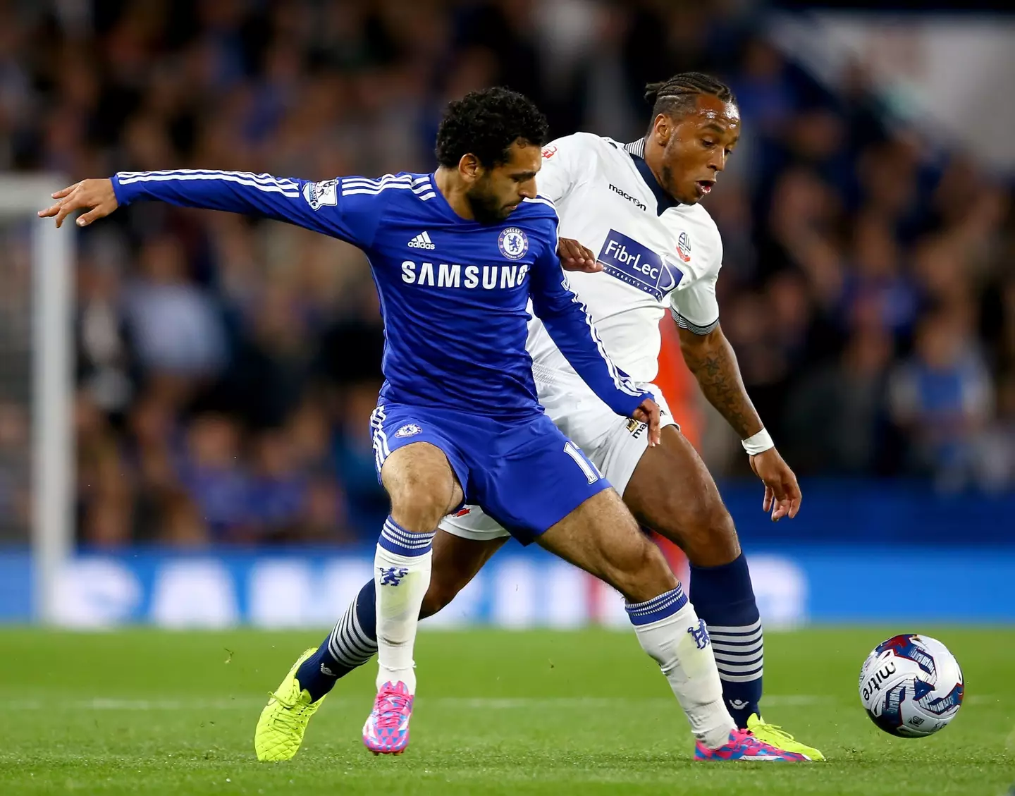 Neil Danns tackling Mohamed Salah during a Captial One Cup Third Round clash between Chelsea and Bolton Wanderers in 2014. Image credit: Getty