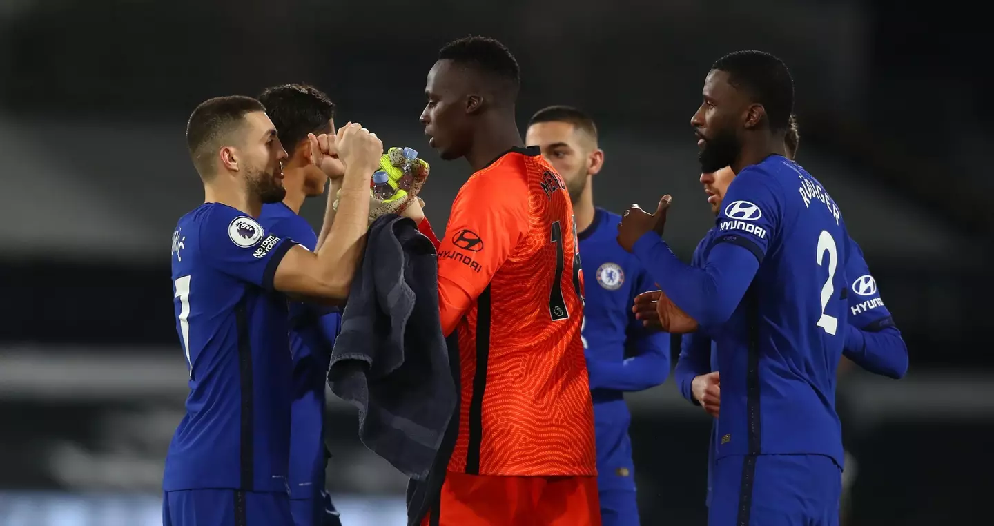 Mateo Kovacic and Edouard Mendy bump fists ahead of a game. Image: Alamy