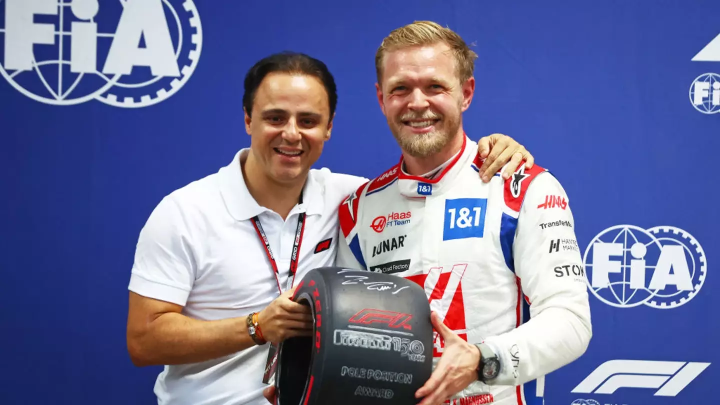 Felipe Massa presented Kevin Magnussen with an award after the Haas driver earned the sprint pole position at the 2022 Brazilian GP (Image: Getty)