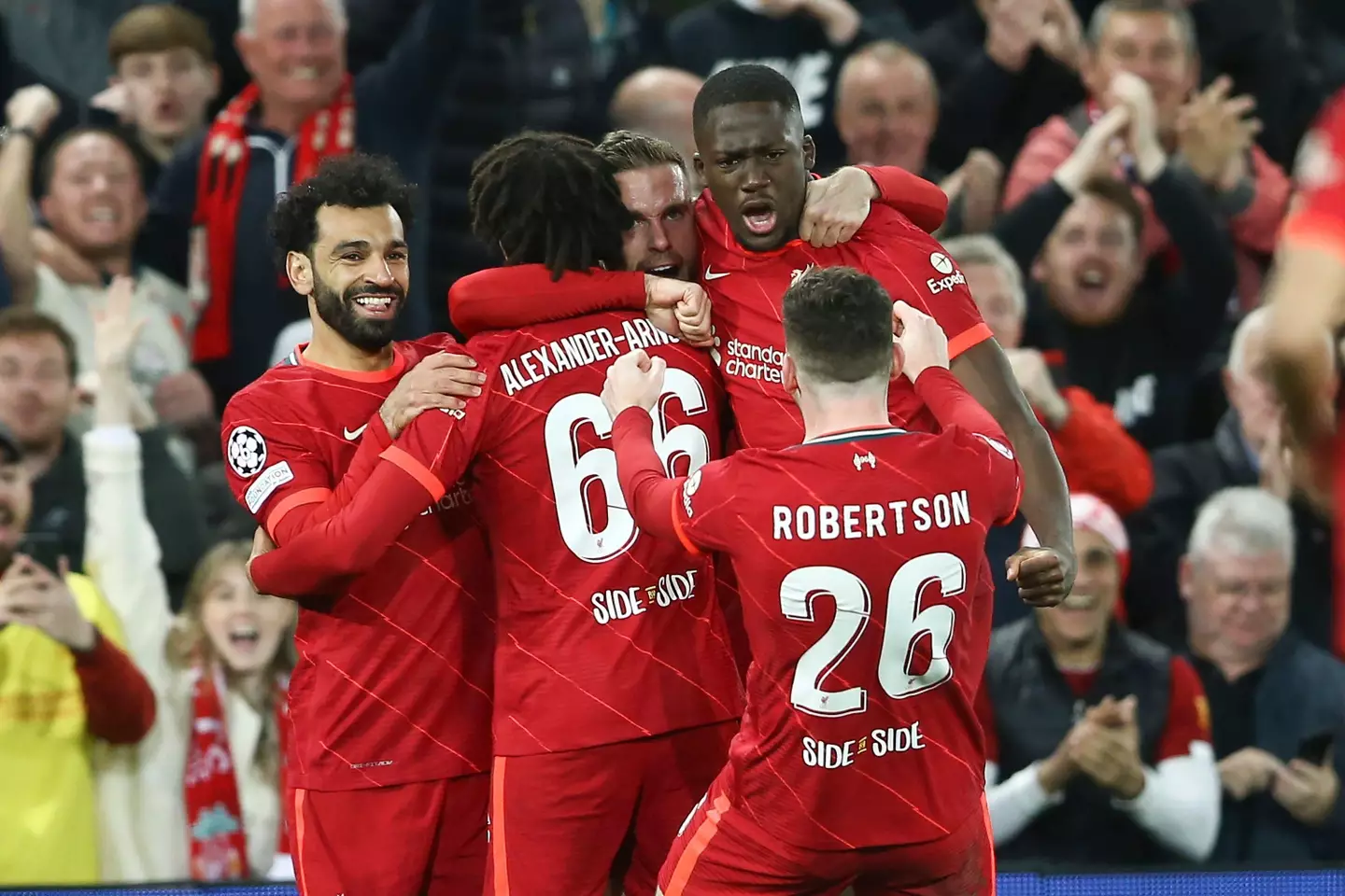 Liverpool players celebrate their opening goal. Image: PA Images