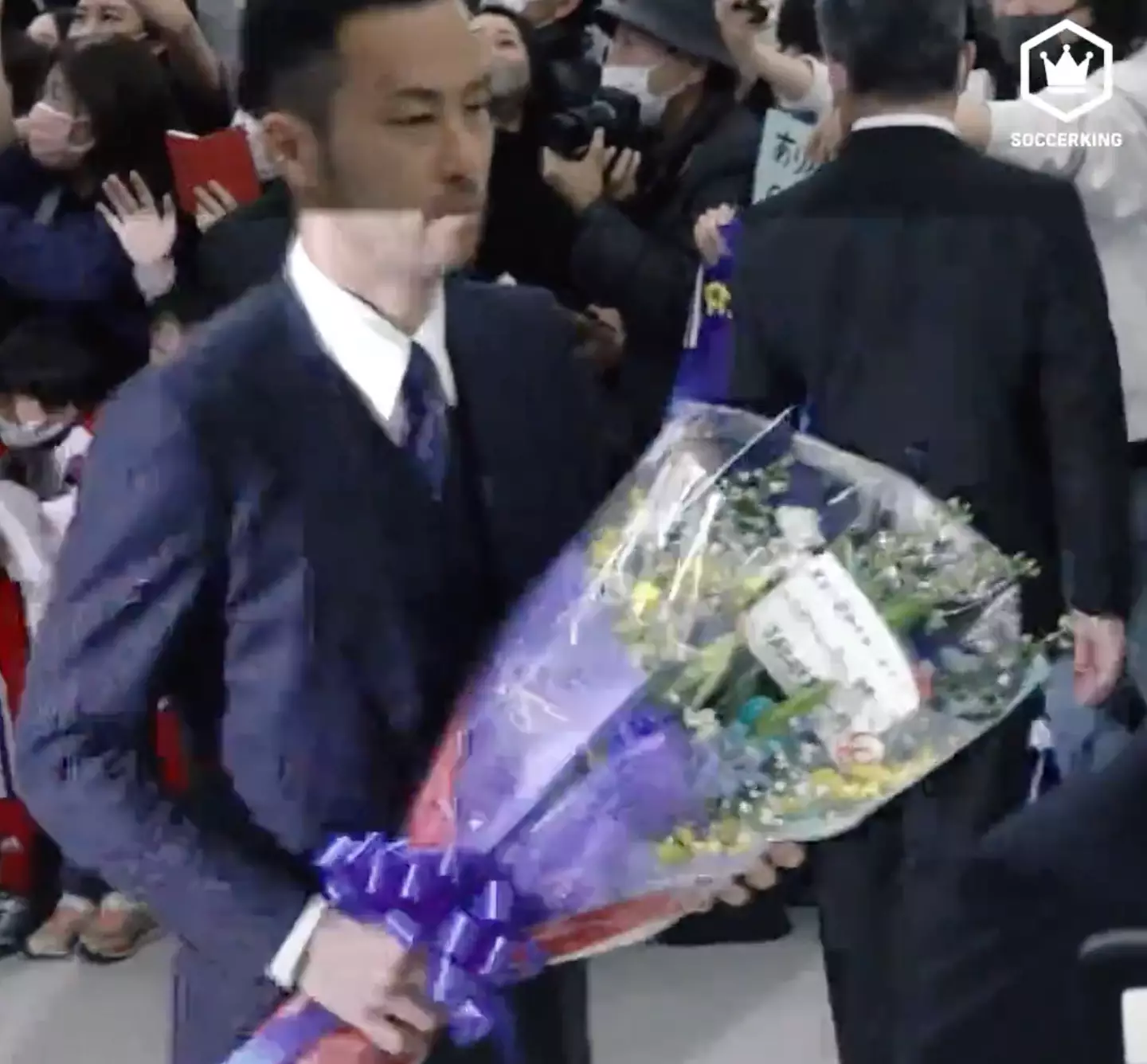 Japan players receive a hero’s welcome after their World Cup campaign in Qatar.