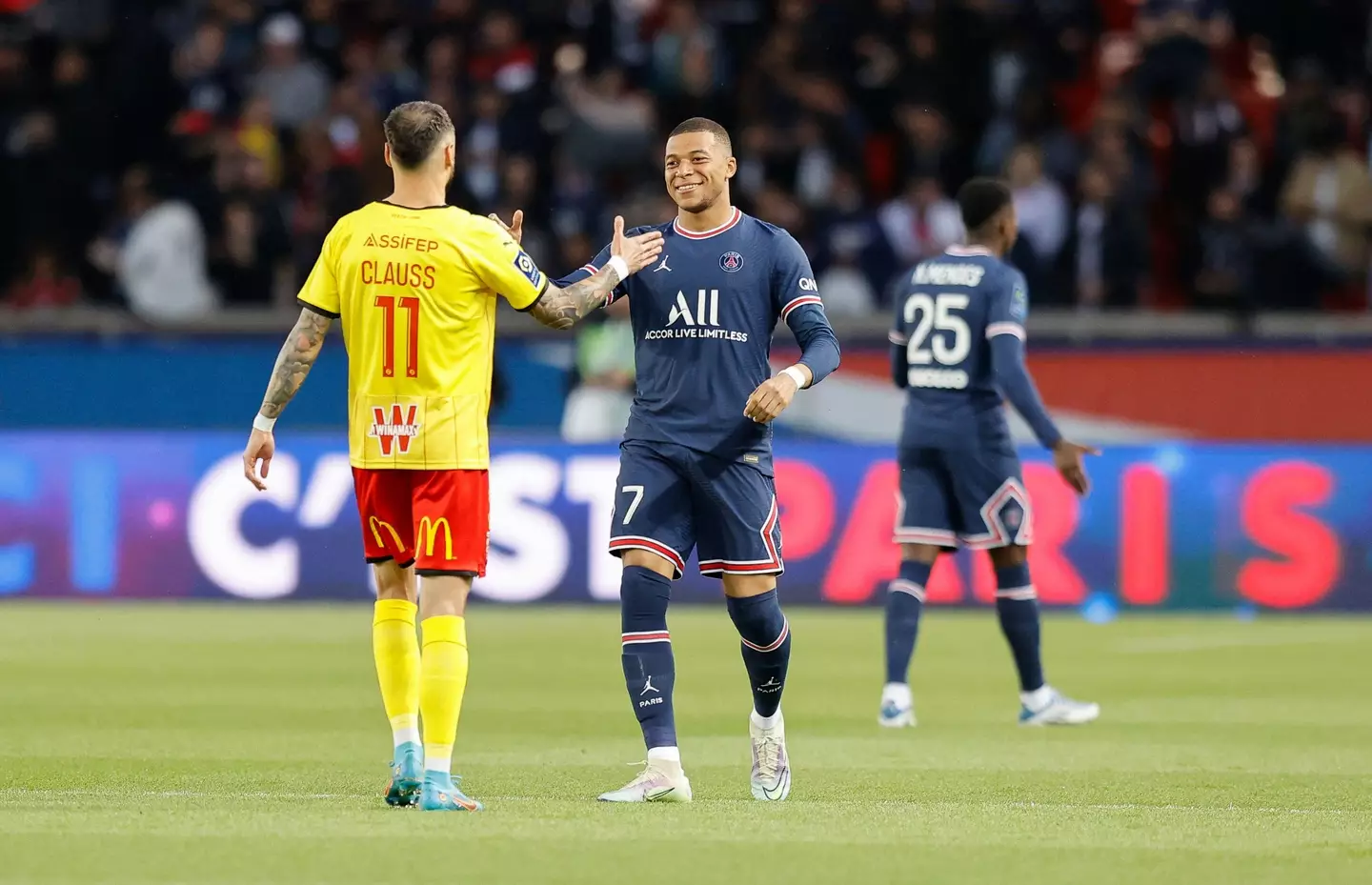 Jonathan Clauss with PSG star Kylian Mbappe. (Alamy)
