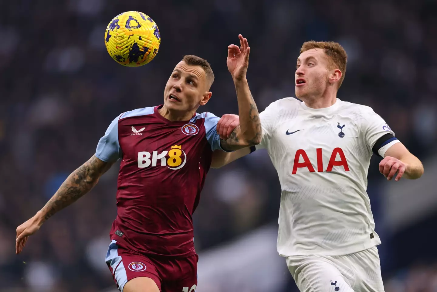 Dejan Kulusevski challenges Lucas Digne for the ball. (Image