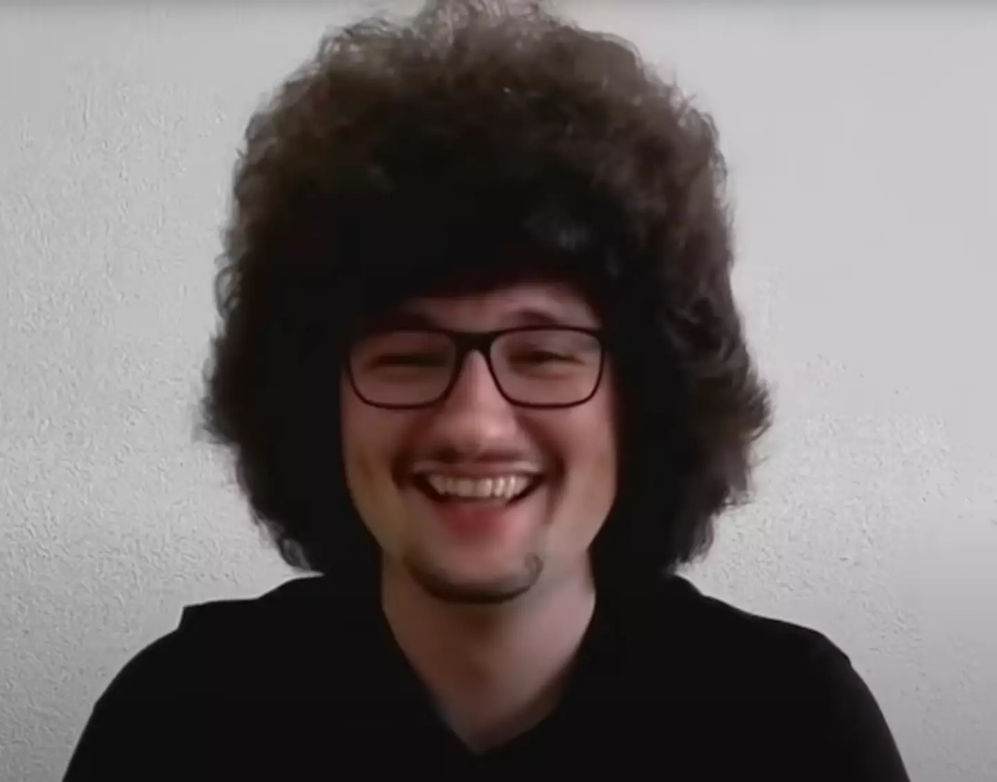 Frank Ilett has gone viral on social media after promising not to cut his hair until United win five consecutive games. (Image: Chris Moyles Show On Radio X)