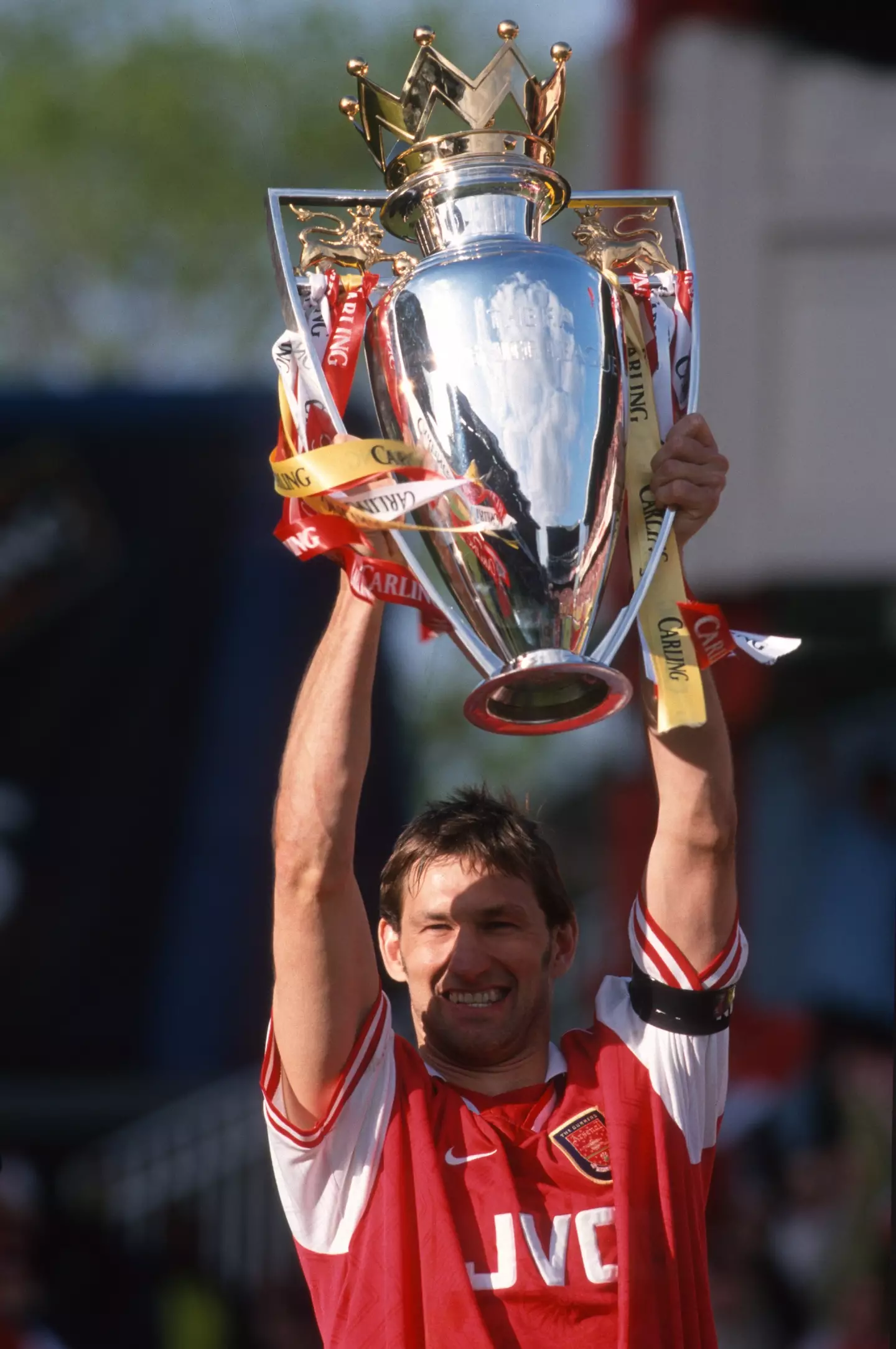 Arsenal captain Tony Adams lifts the league title. Image credit: Getty