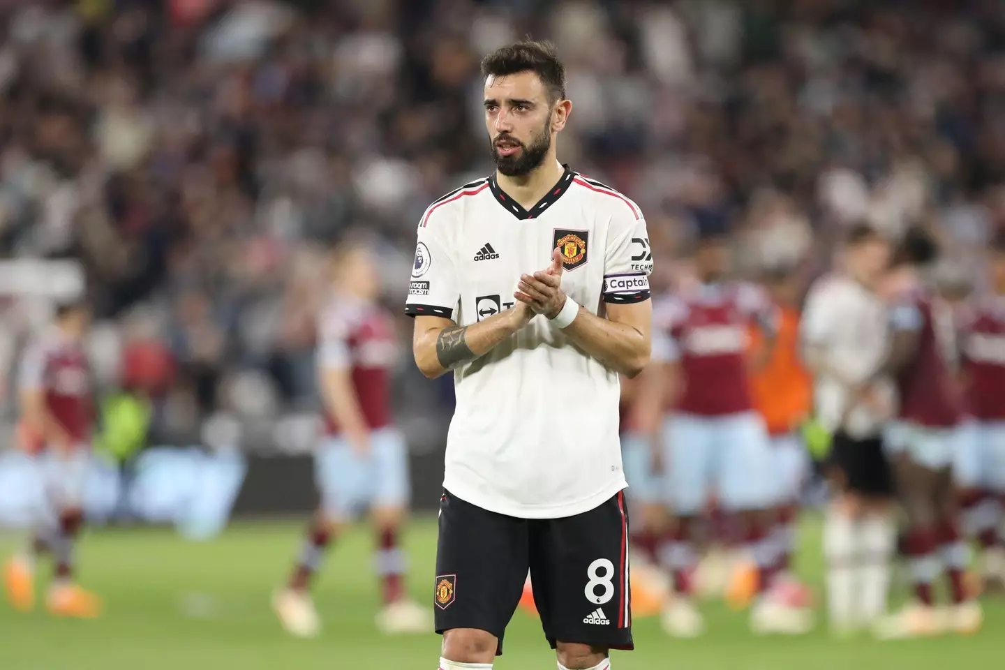 Bruno Fernandes applauds the Man United fans after defeat at West Ham United. Image: Alamy