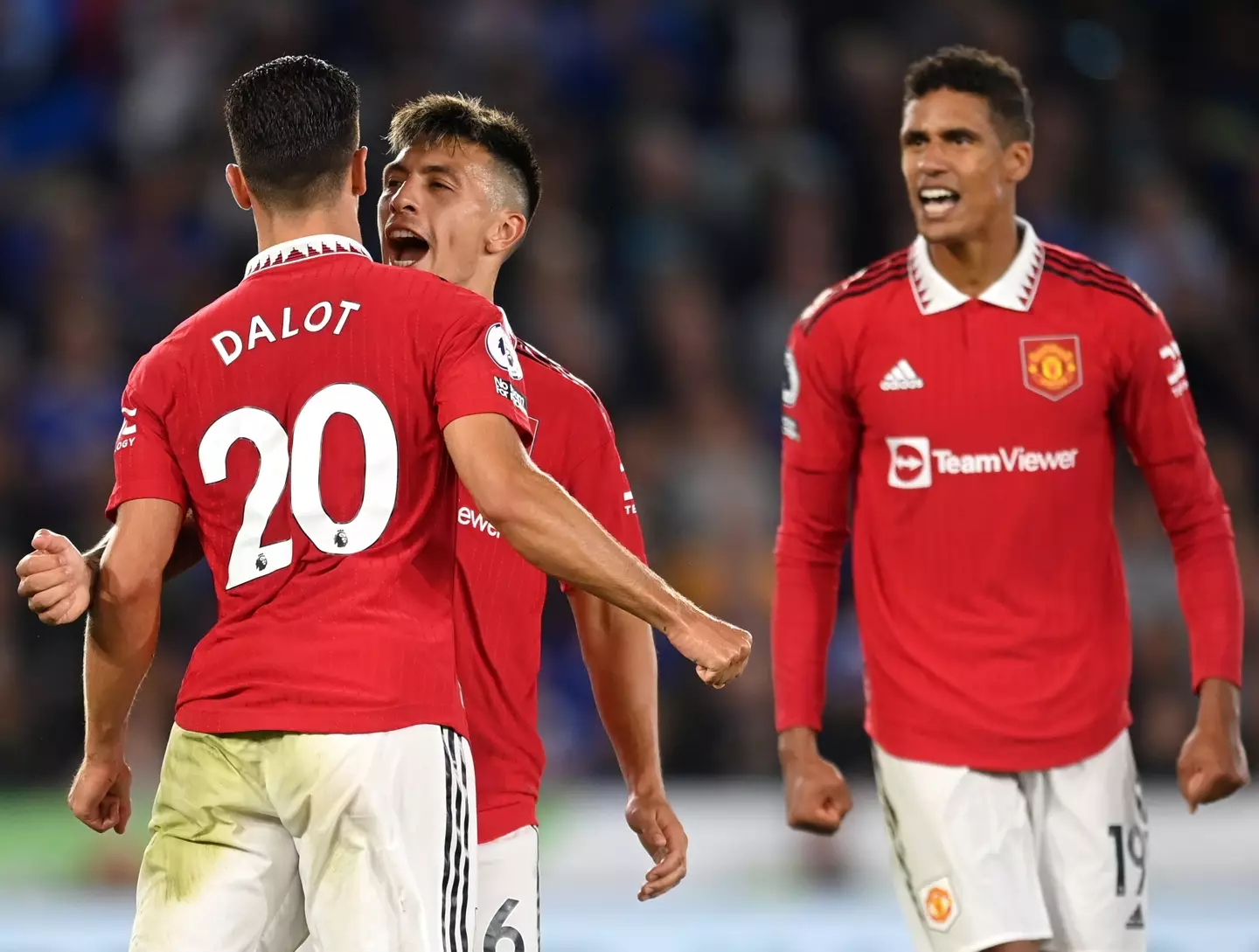 Diogo Dalot, Lisandro Martinez and Raphael Varane celebrate against Leicester City. (Man Utd)