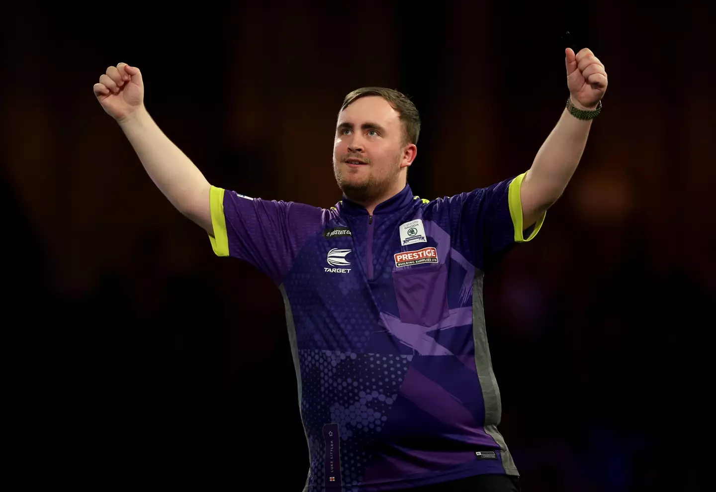 Luke Littler celebrates after beating Rob Cross. Image: Getty