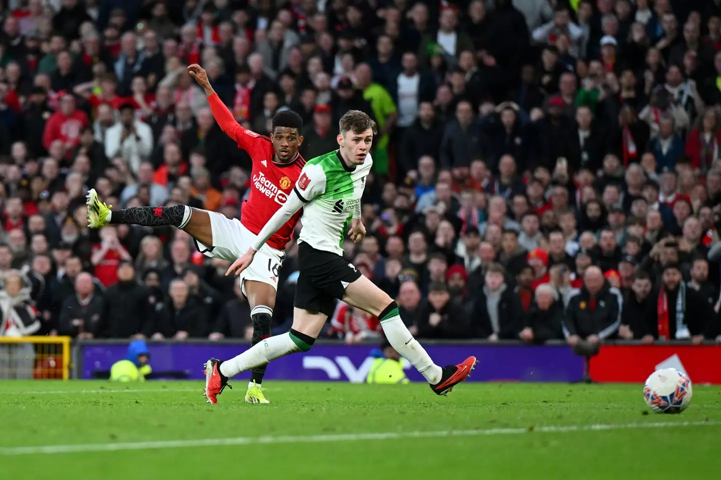 Amad firing home the winner as Liverpool full-back Conor Bradley looks on. (Image