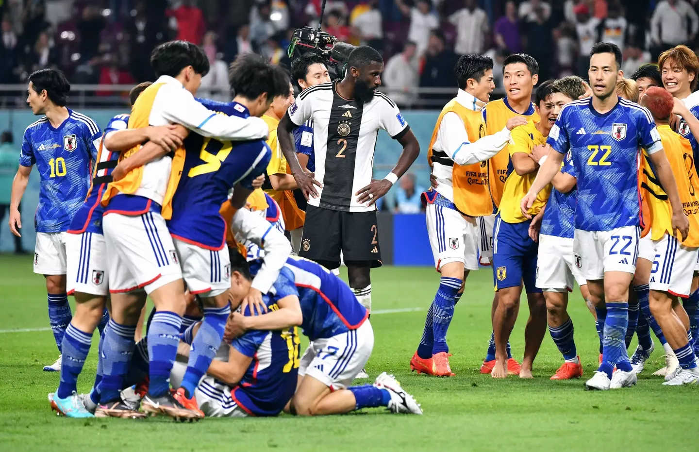 Japan players celebrate their win. (Image