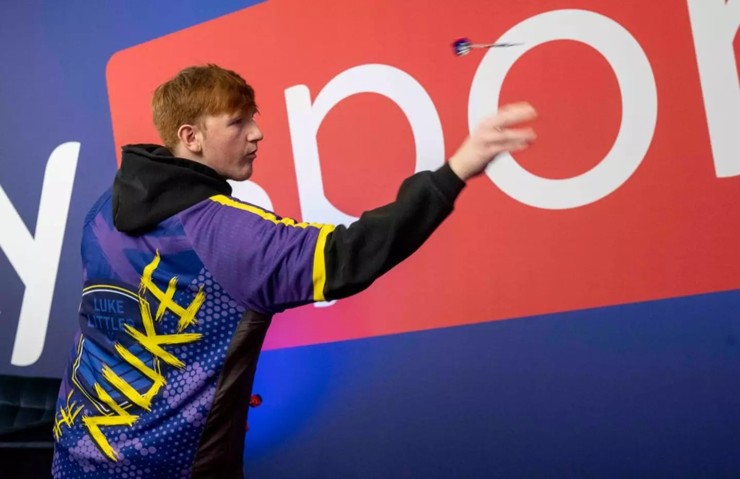 Ginge accompanied Littler to the World Championship final this year. (Image: Stuart C. Wilson/Getty Images for Sky Creative Brand)