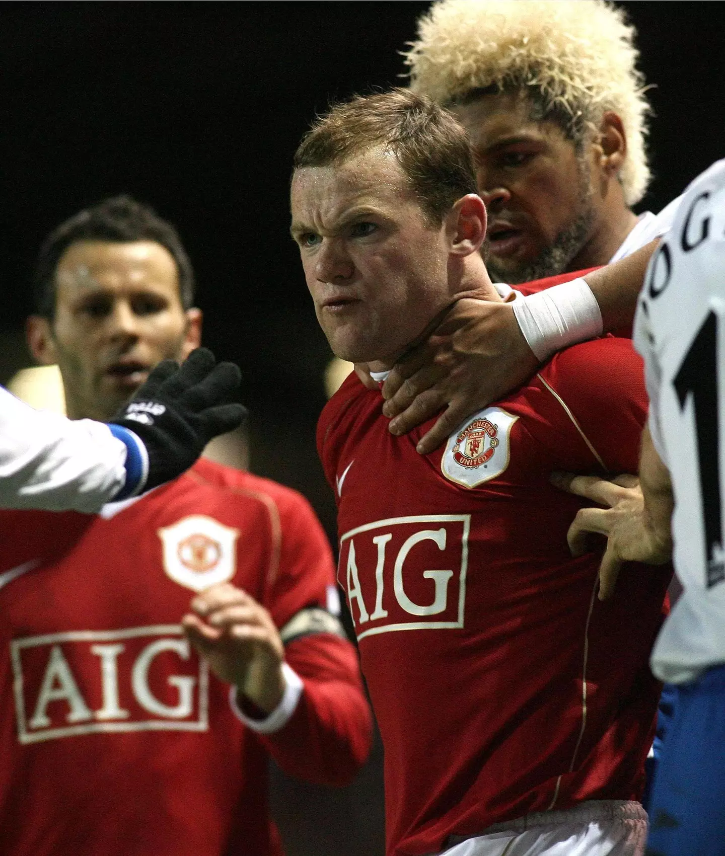 Wayne Rooney heated in a Manchester United fixture | Alamy