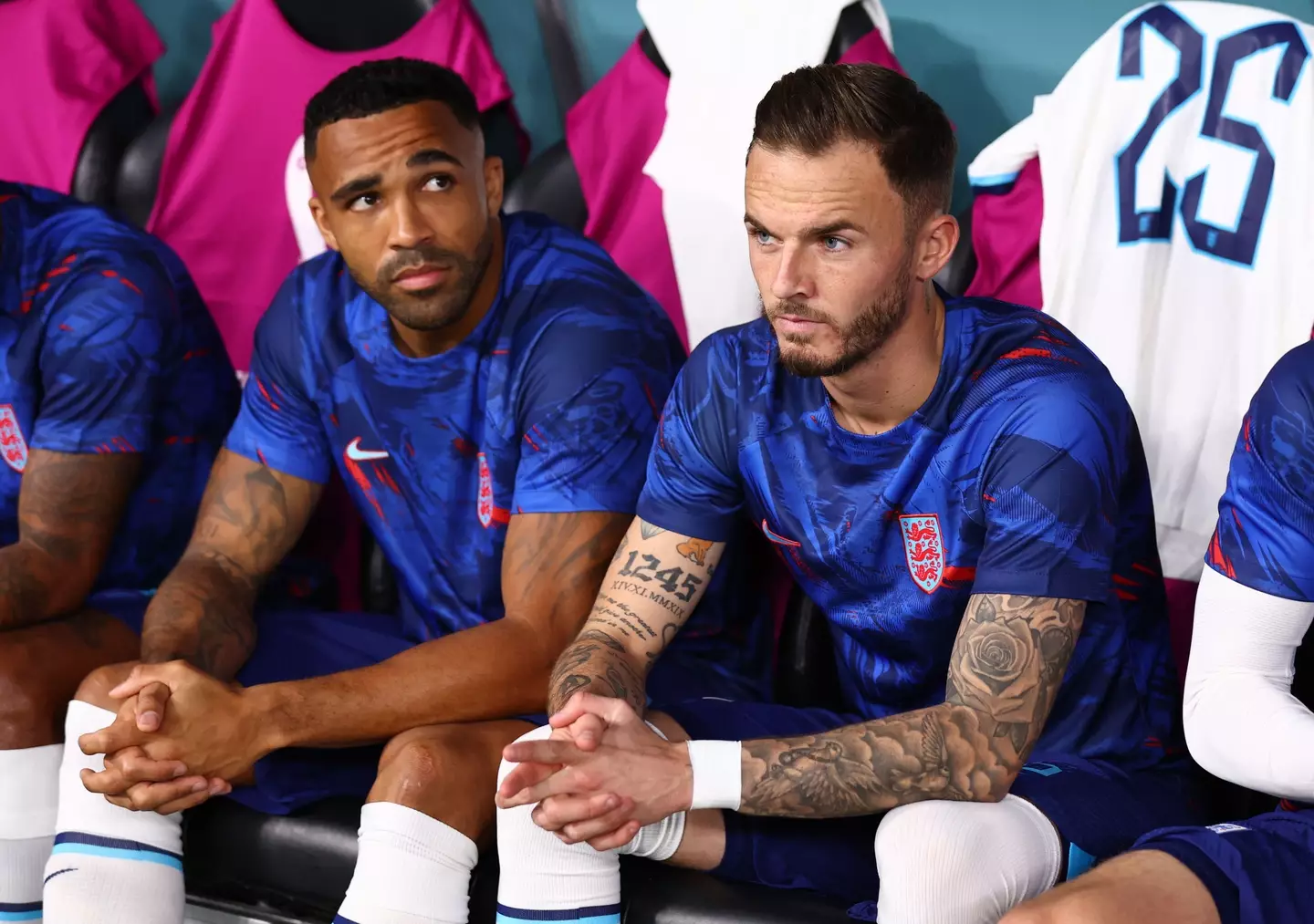 Newcastle striker Callum Wilson [left] with Leicester City star James Maddison [right] on the England bench at the World Cup in Qatar.