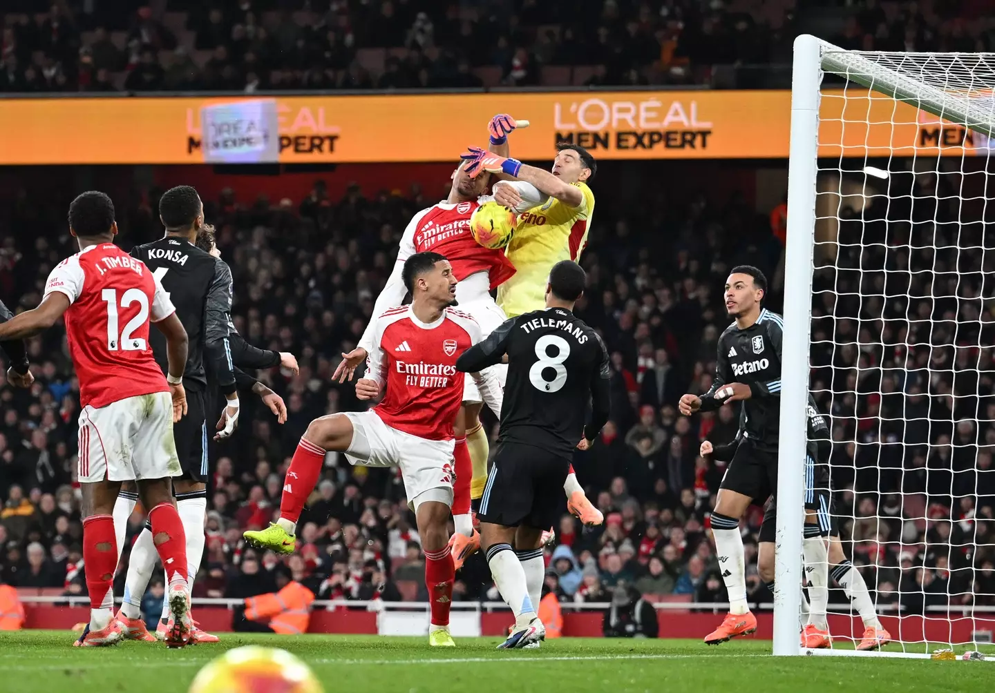 Emi Martinez and Gabriel challenging for the ball (credit: getty)
