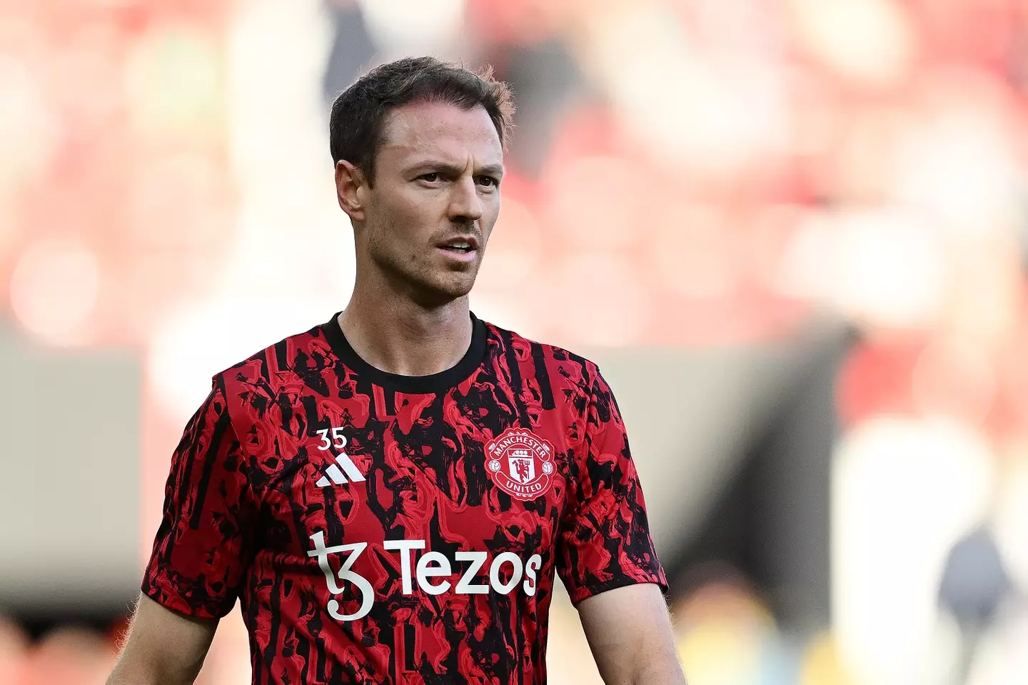 Evans won it all at MUFC (Michael Regan/Getty Images)