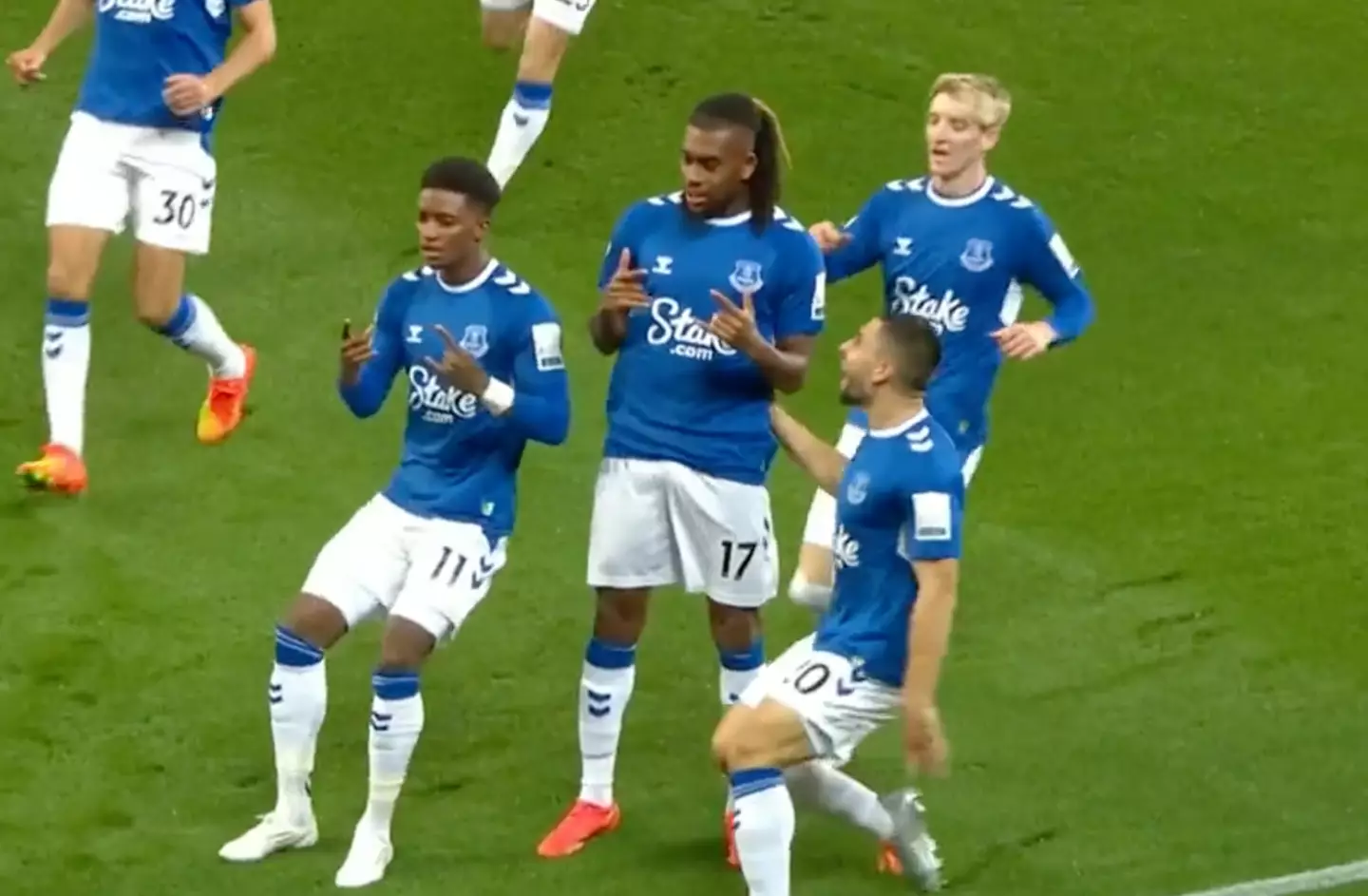 Iwobi celebrates his opening goal with his Everton teammates.