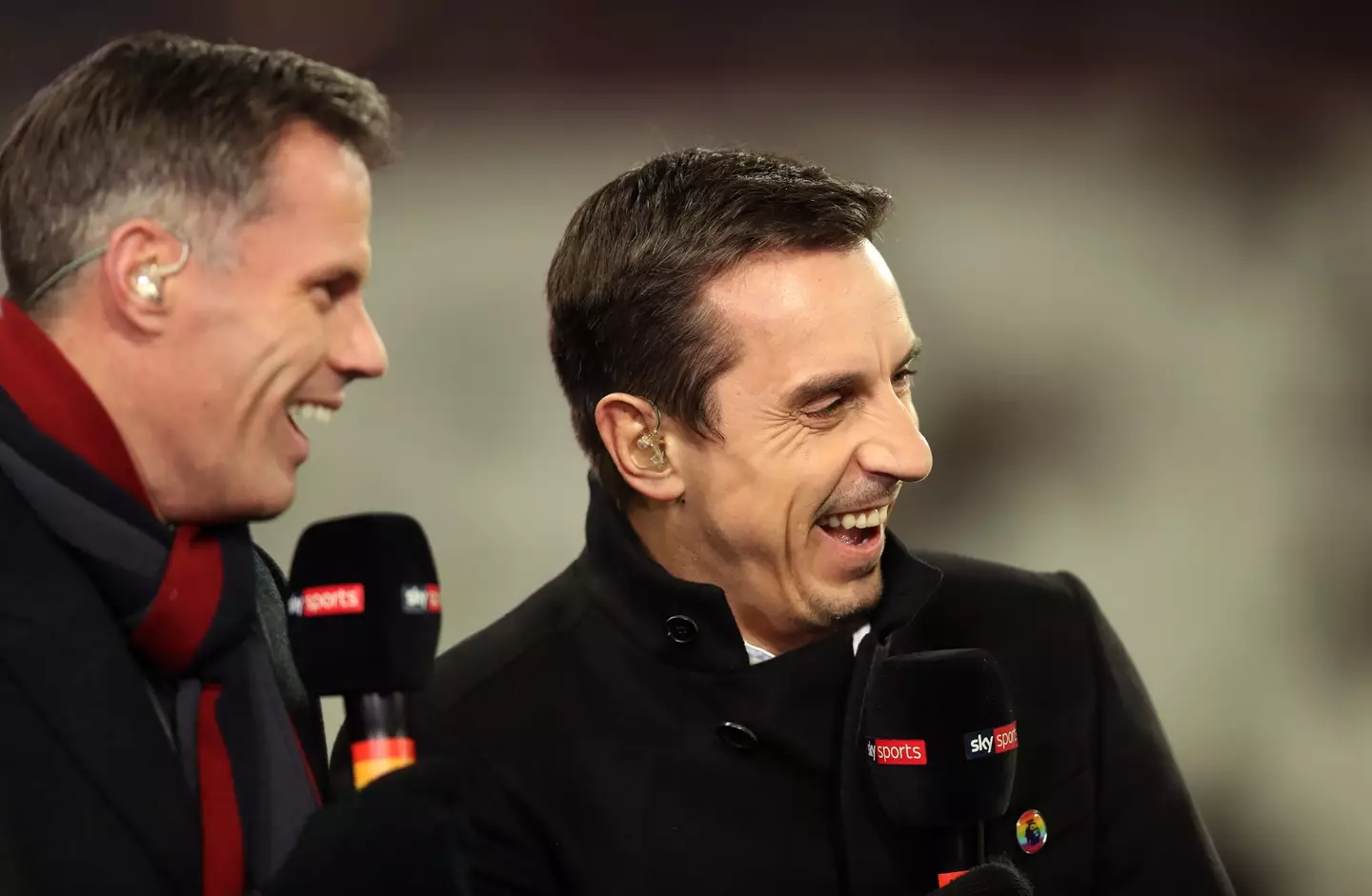 Neville and Carragher enjoy a laugh together. Image: Getty