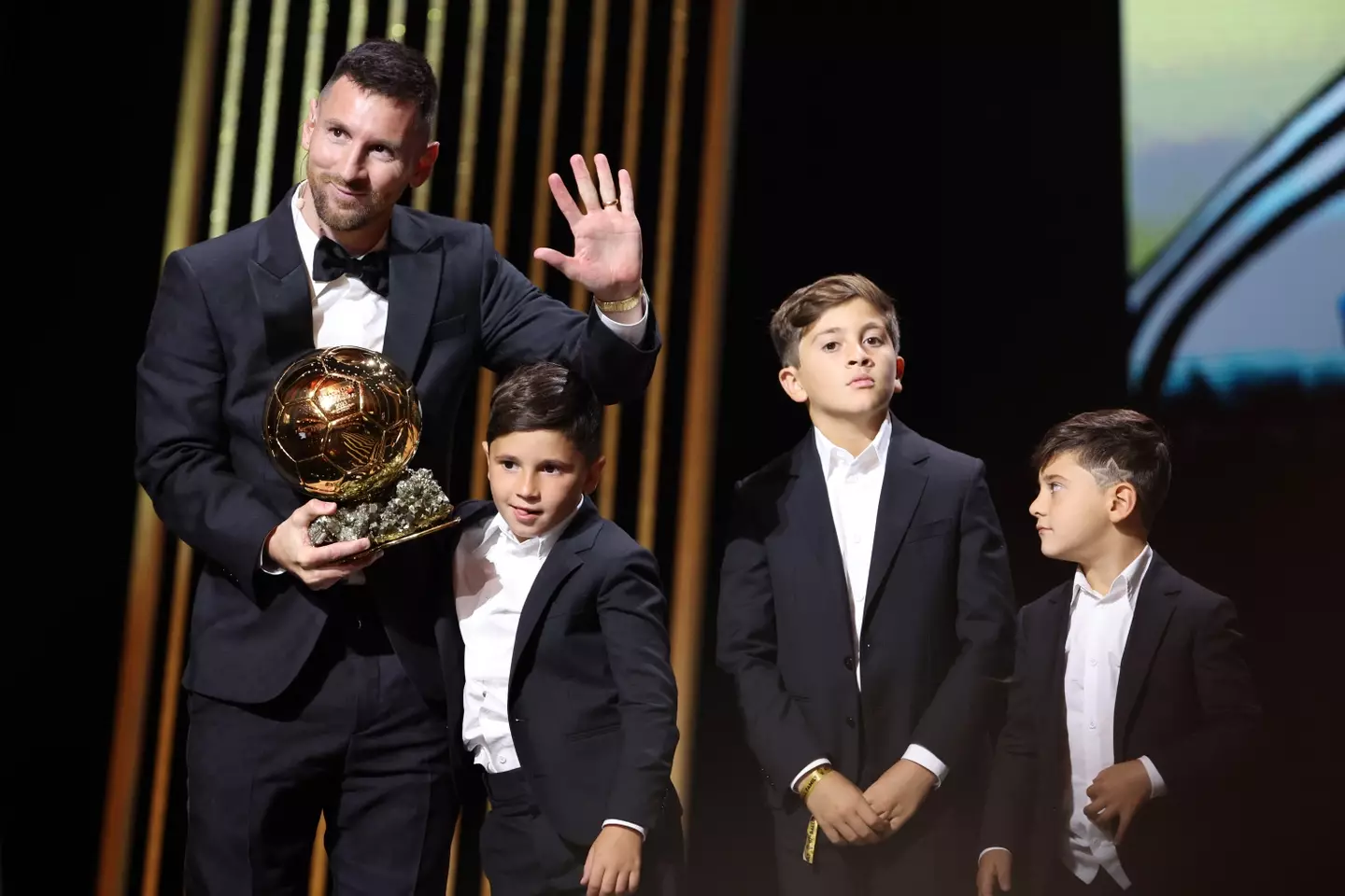 Lionel Messi on stage with his Ballon d'Or award. Image: Getty 