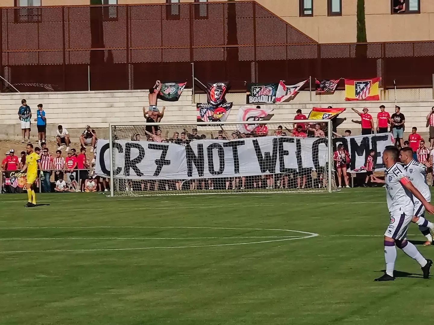 Atletico Madrid fans produced a "CR7 NOT WELCOME" sign at a pre-season friendly on Wednesday. (Twitter: JaviGomezCh)