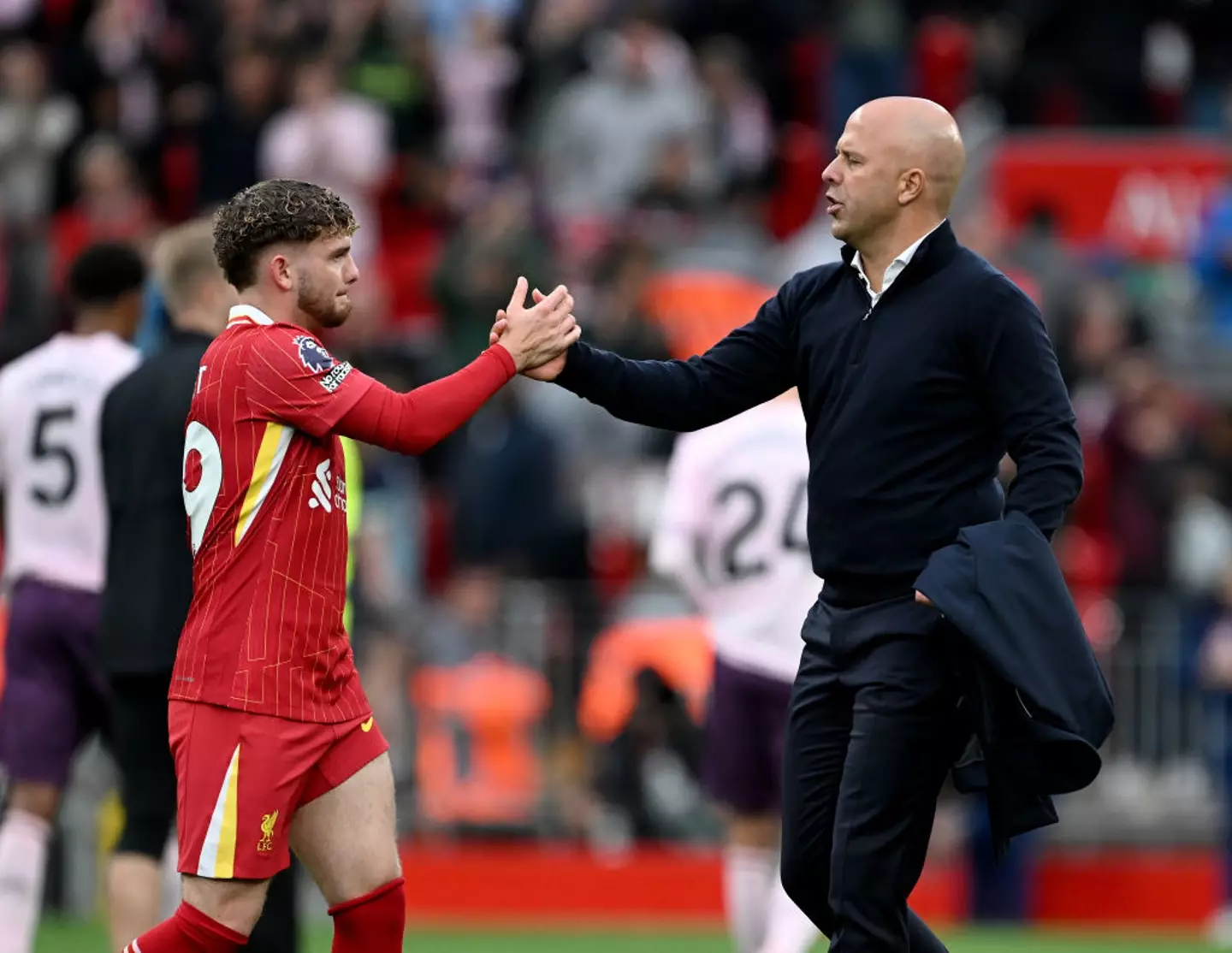Liverpool midfielder Harvey Elliott and new manager Arne Slot pictured -