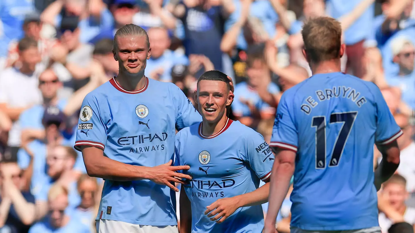 Erling Haaland congratulates Phil Foden (Image: News Images LTD/Alamy)