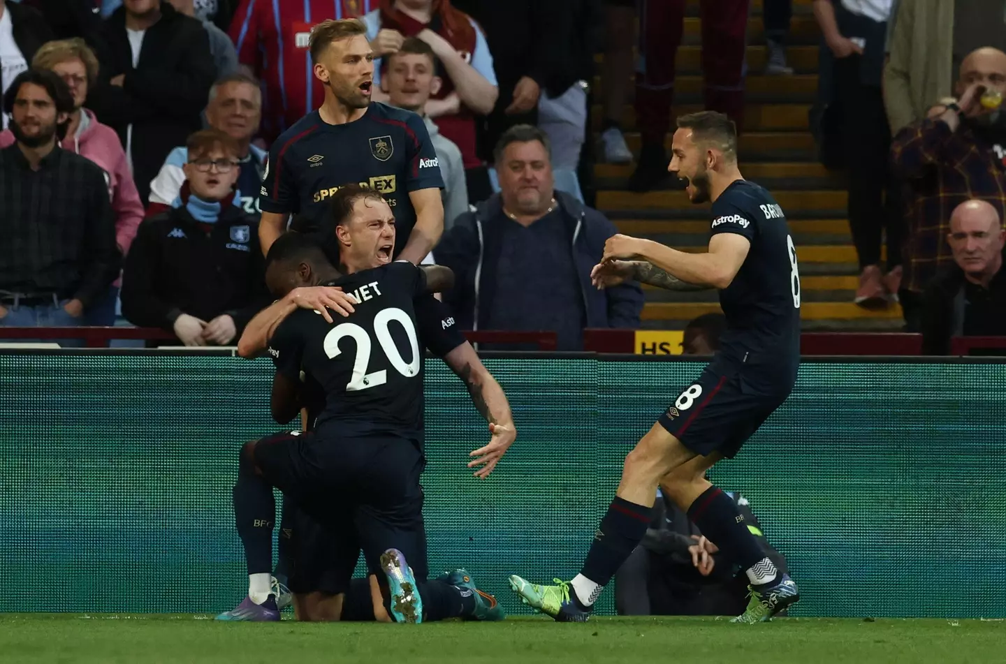 Burnley players celebrate Barnes' goal. Image: PA Images