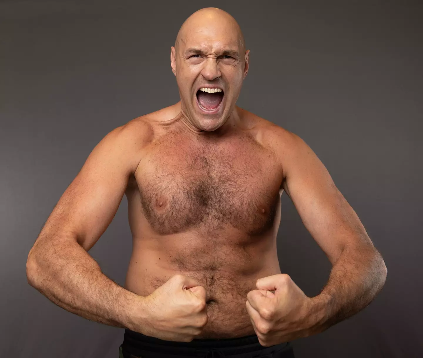 Tyson Fury shows off his new physique. Image: Getty