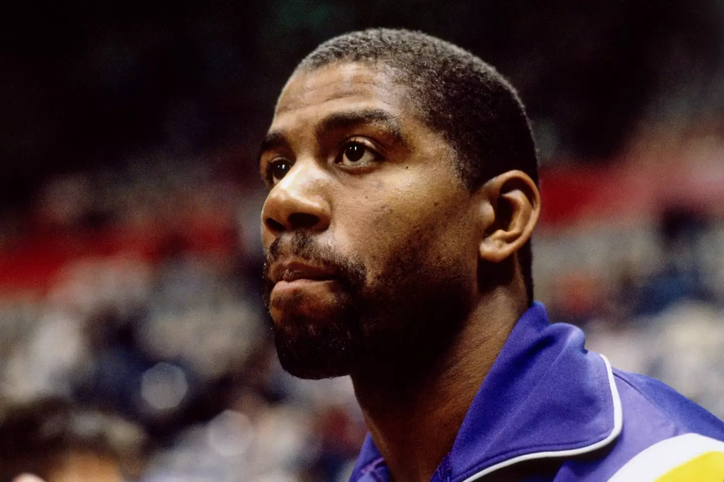 Magic Johnson looks on during a 1990 NBA match between Los Angeles Lakers and the Portland Trailblazers