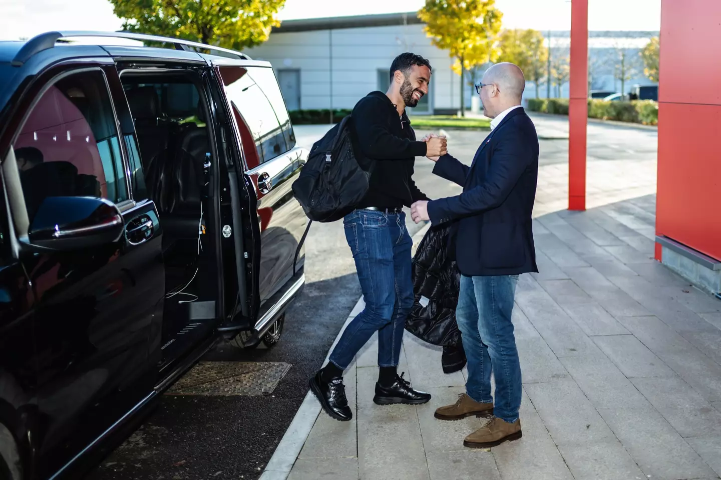 Ruben Amorim is greeted by Man Utd CEO Omar Barrada at Carrington on Monday. Image credit: Getty